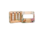 A boxed set of three hand and foot care bottles displayed in an open floral tin box on a white background. The set includes Dr.