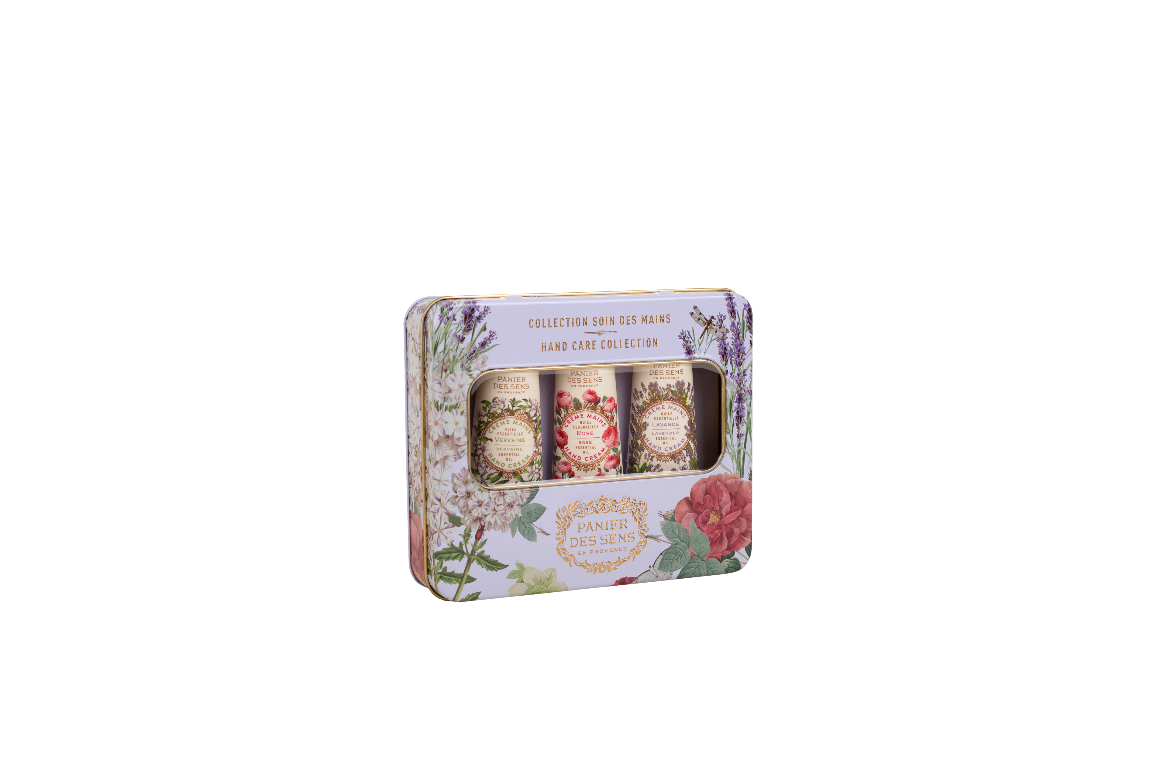 A rectangular decorative tin containing three small cylindrical bottles, shown on a plain white background. The tin has a floral print with lavender, roses, and green leaves, and the label reads 'Collection Soin des Manes Hair Magic' and 'Panachie Collection'.