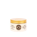 Jar of Royal Body Cream with gold lid on a white background