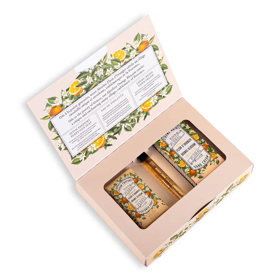 Gift set with soap and scrub in a decorative box on a white background