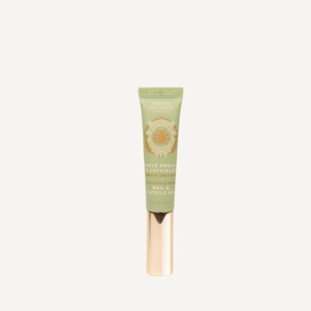 Cuticle Oil in a light sage green squeeze tube with a metallic rose gold cap, centered on a light off-white background.