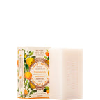 A bar of Panier Des Sens Provence vegetable oil soap next to its illustrated packaging box, featuring orange and yellow citrus graphics on a white background.