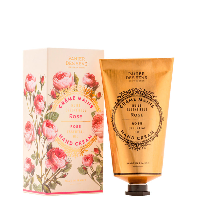 Panier Des Sens Rose Hand Cream set, featuring a metallic gold squeeze tube and its matching pink rose illustrated packaging box on a white background.