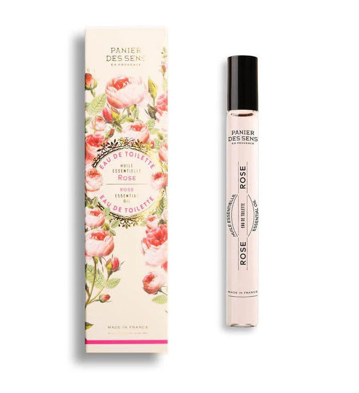 Panier Des Sens Rose Eau de Toilette set, featuring a tall rectangular floral box with pink rose illustrations and a matching clear glass spray bottle with a black cap, on a white background.
