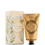 Panier des Sens Crème Mains Sea Samphire Essential Oil Hand Cream, shown in a metallic gold squeeze tube next to its illustrated cream box.