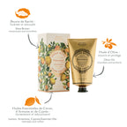 A hand cream tube and matching box from Daniel Desvres, featuring a golden tube and an illustrated cream-colored box with lemons and green branches. French and English text highlights key ingredients including Shea Butter, Olive Oil, and Lemon, Artemisia, and Cypress Essential Oils on a white background.