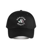 Black cap with 'Mahjong Addict' text and design on a white background