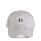 Gray cap with 'Wahcon Addict' text and box design on a white background