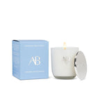 AB candle with packaging on a white background.