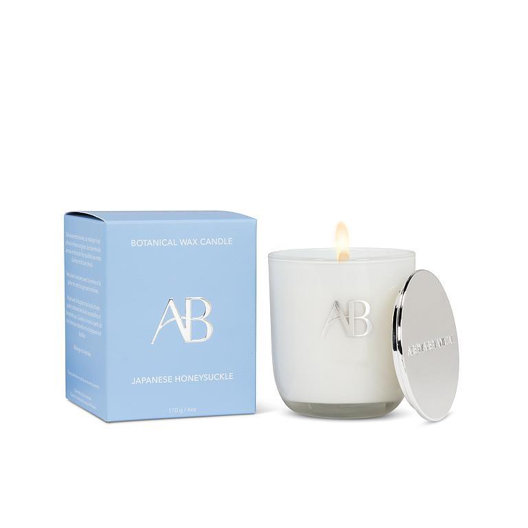 AB candle with packaging on a white background.