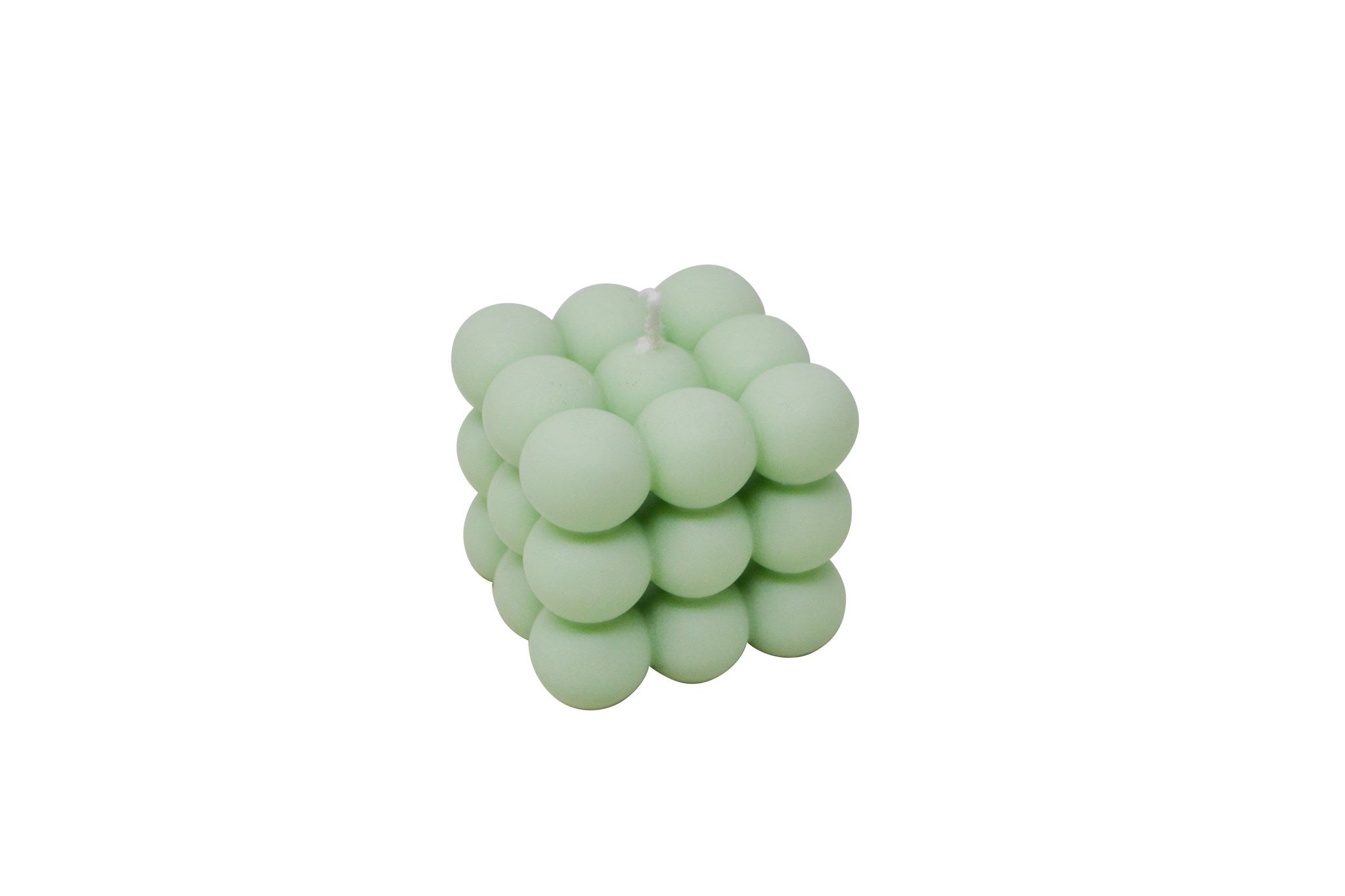 Light green textured ball on a white background