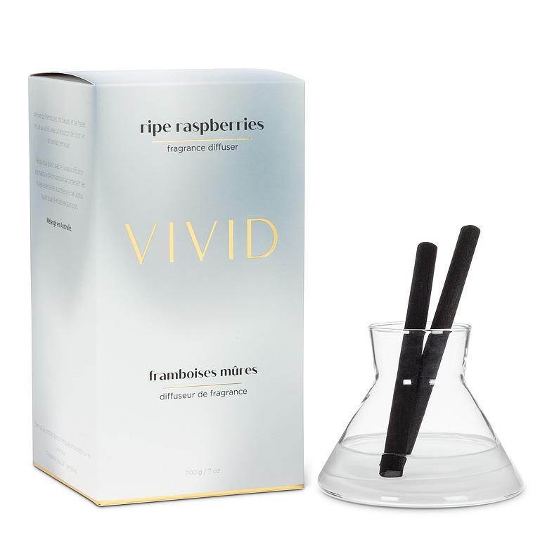 Vivid fragrance diffuser with packaging on a white background