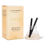 Vivid coconut elderflower fragrance diffuser with packaging on a white background