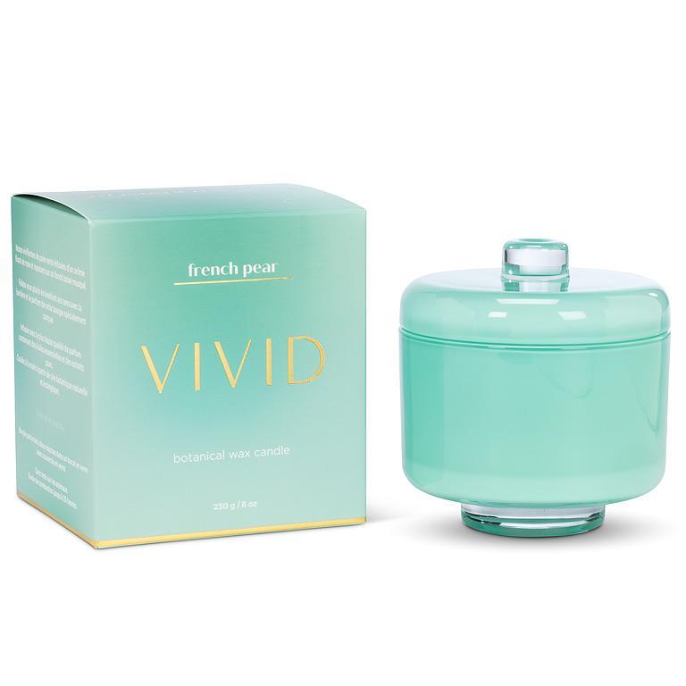 Mint green candle with lid and packaging labeled 'Vivid' on a white background