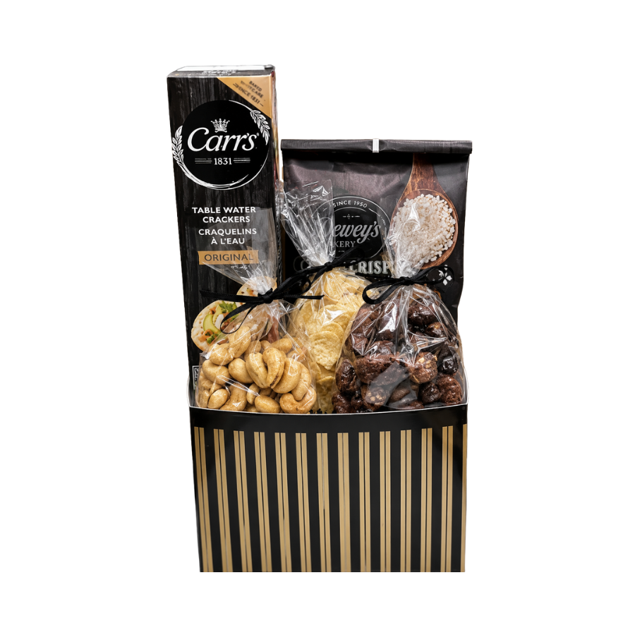 Gift basket with snacks and crackers on a white background