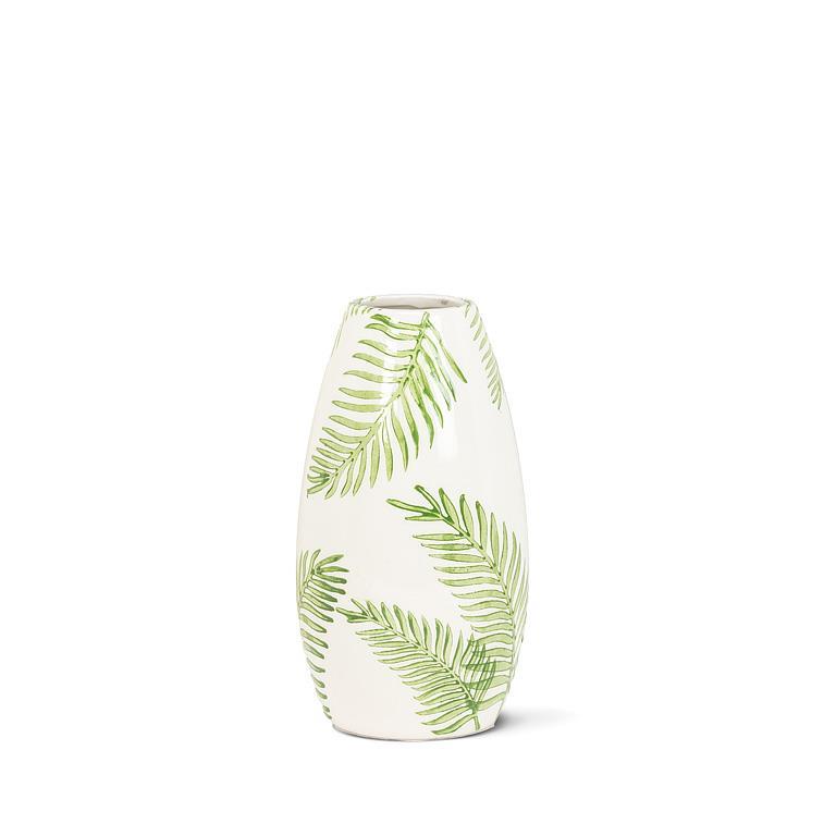 White vase with green leaf pattern on a white background