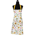 Floral apron with yellow straps on a mannequin against a white background