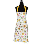 Floral apron with yellow straps on a mannequin against a white background
