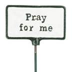 Metal sign with 'Pray for me' text on a white background
