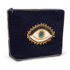 Navy blue pouch with an embroidered eye design on a white background