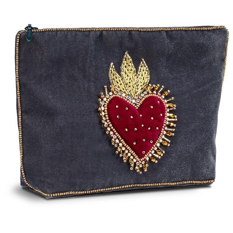 Velvet pouch with a red heart and gold accents on a white background