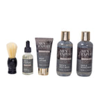 Men's grooming products including a brush, oil, lotion, and two bottles on a white background.