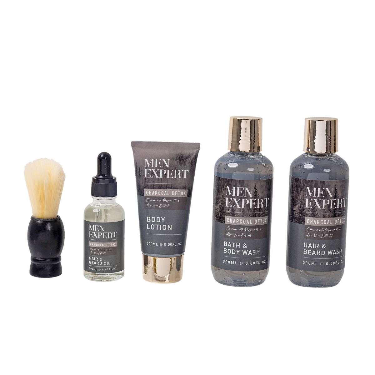 Men's grooming products including a brush, oil, lotion, and two bottles on a white background.