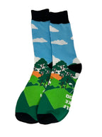 Socks with a nature-themed design featuring trees and blue sky on a white background