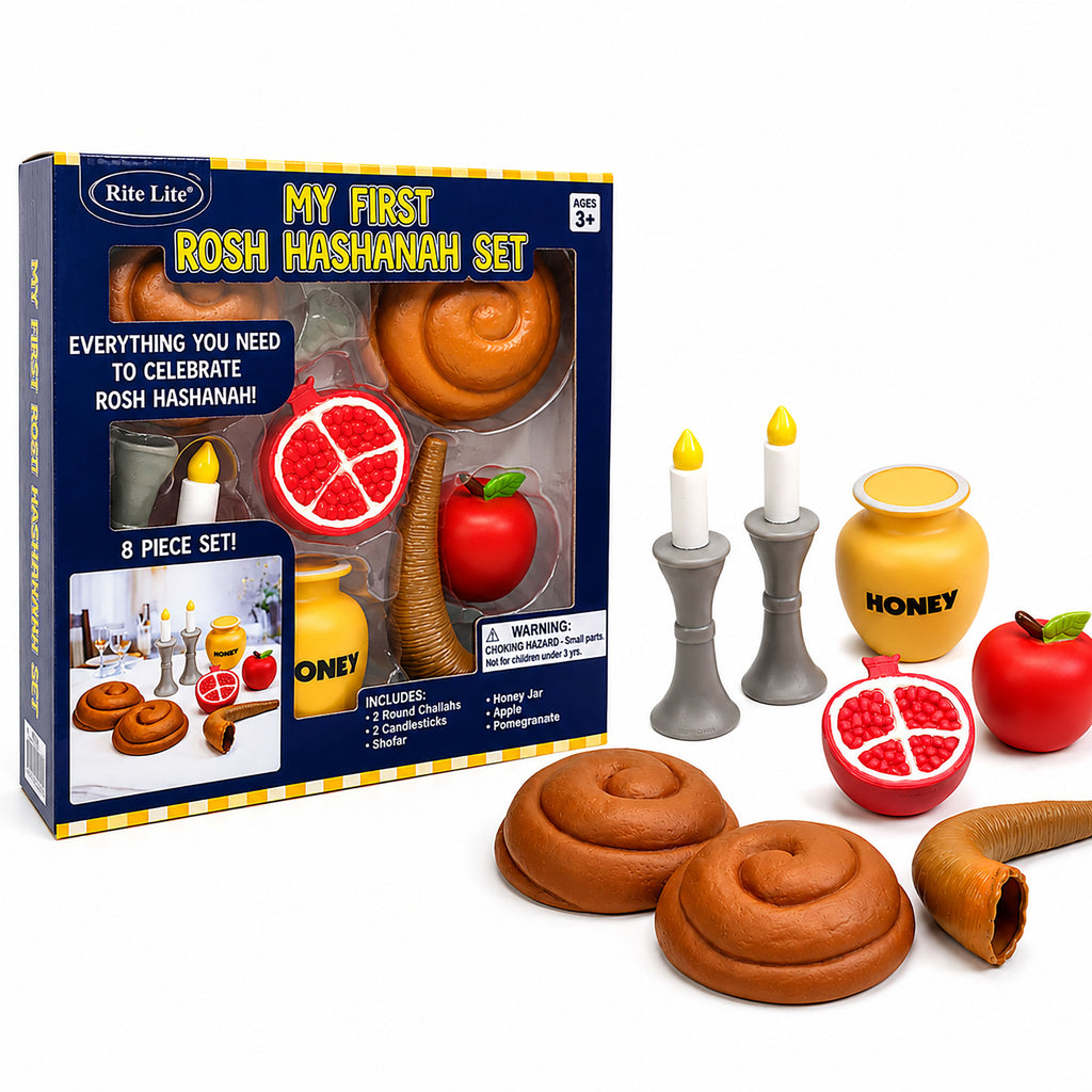 Rite Lite My First Rosh Hashanah Set toy food and candle play set, showing the retail box and several included pieces including plastic challah, a honey pot, pomegranate halves, apples, candles, and a branch on a white background.