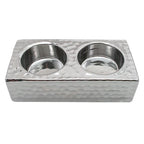 Metallic double candle holder on a white background