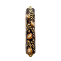 A dark brown and gold pomegranate-themed mezuzah case with a hanging loop at the top, shown against a plain white background.