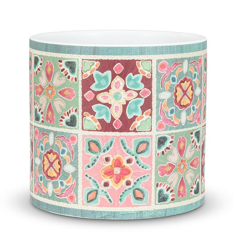 Decorative cylindrical vase with colorful geometric pattern on a white background