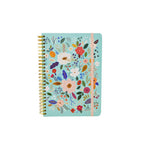 Notebook with floral design on a white background