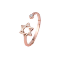 Rose gold ring with star of david design on a white background