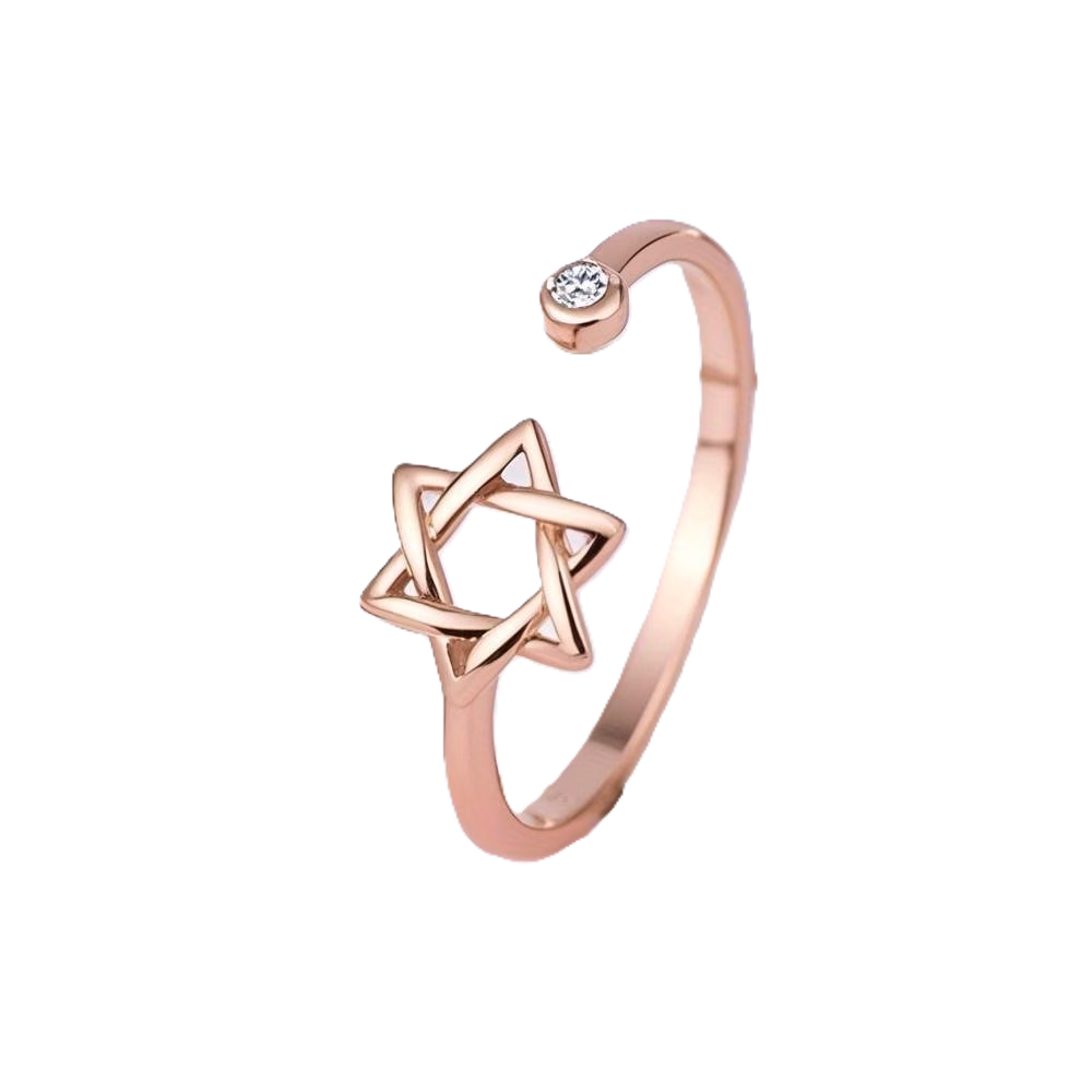 Rose gold ring with star of david design on a white background