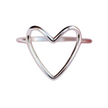 Heart-shaped ring on a blue background