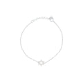 A delicate silver chain bracelet featuring a central Star of David charm paved with small clear stones, displayed on a clean white background.
