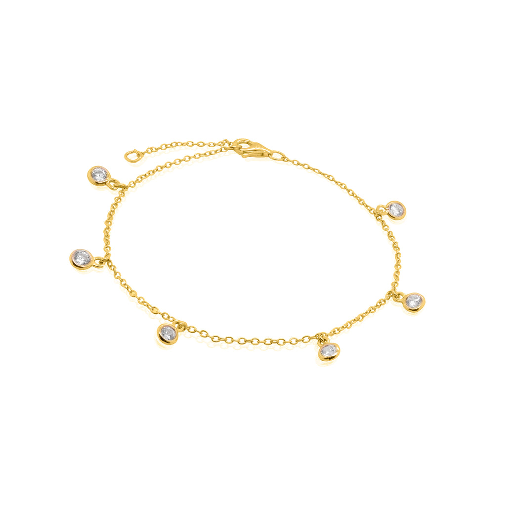 Gold bracelet with small diamonds on a white background.