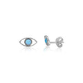 A pair of silver eye stud earrings with light blue gemstone centers, shown from the front and side on a white background.