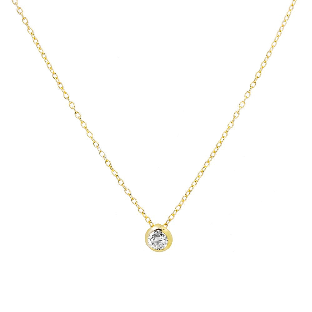 A delicate yellow gold chain necklace with a small round bezel-set clear gemstone pendant, shown against a plain white background.