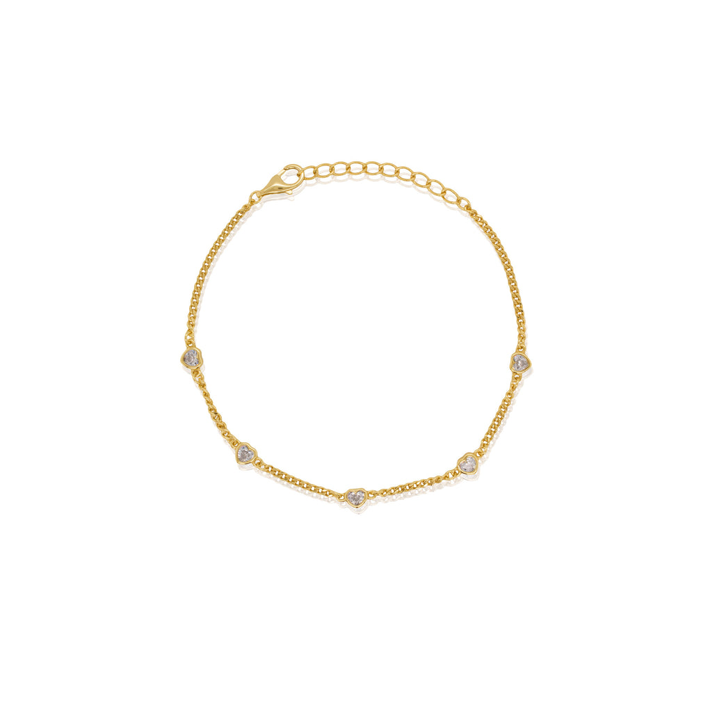 Gold bracelet with small diamonds on a white background