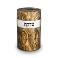Metal cylindrical container with marbled pattern and Hebrew text on a white background