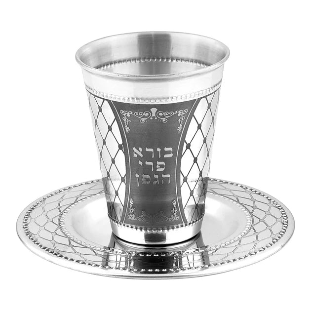 Silver kiddush cup with matching saucer on a white background