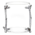 Acrylic washing cup with silver branch-like holders on a white background