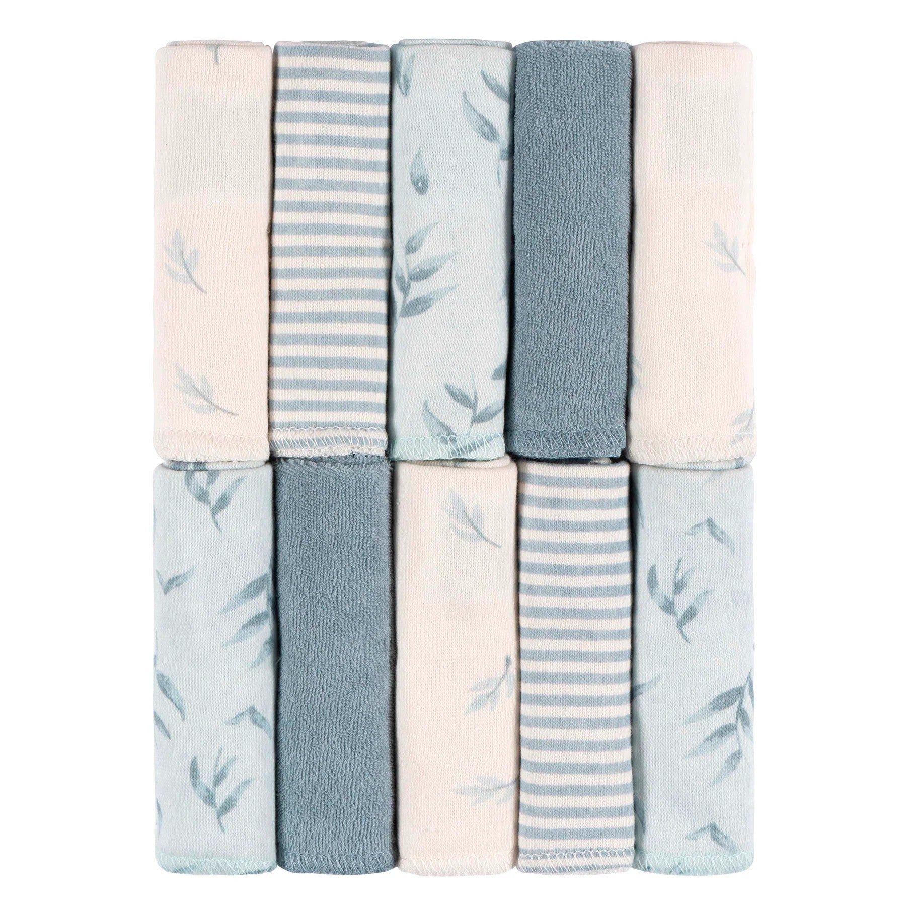Set of folded towels with leaf pattern in pastel colors on a white background