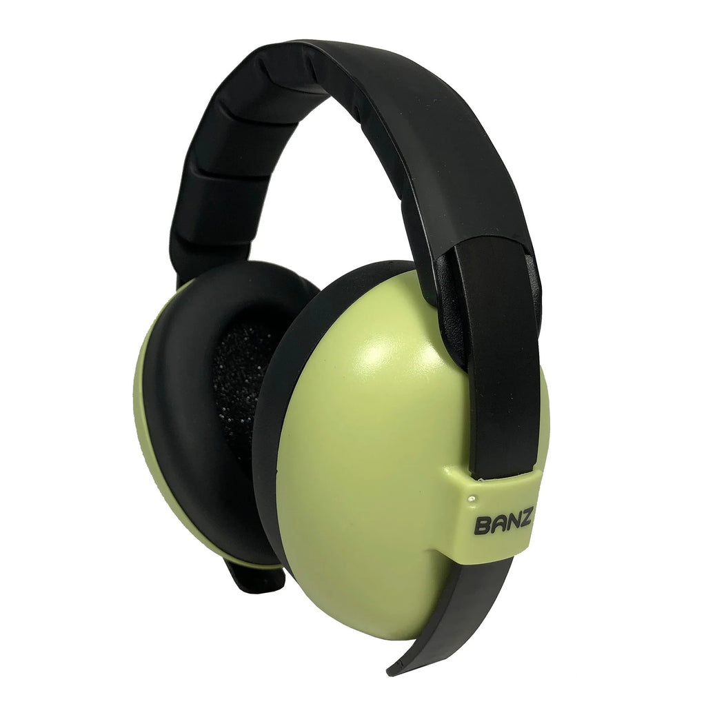 Black and green ear protection headphones on a white background