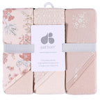 Set of three hooded towels with floral patterns and 'just born' branding.