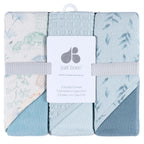 Set of three hooded towels with floral patterns in packaging, featuring 'just born' brand.