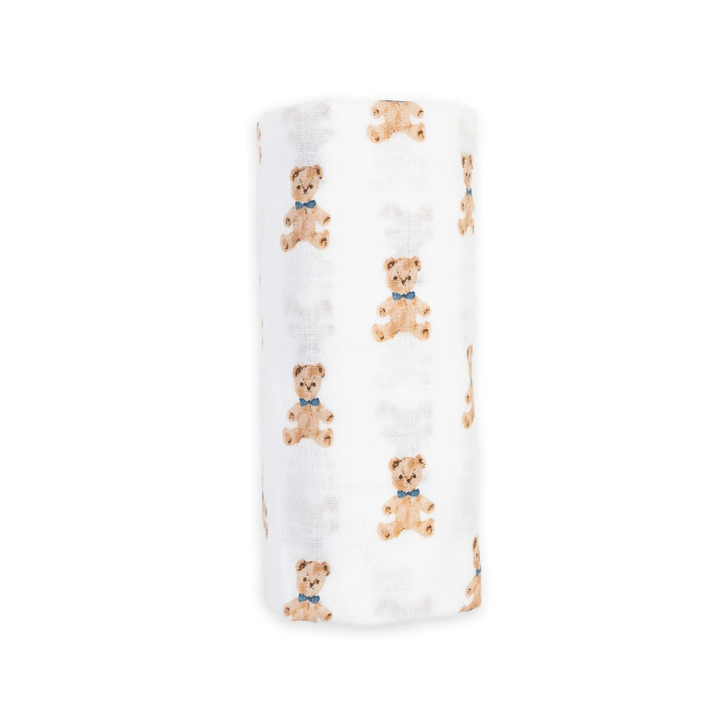 White blanket with teddy bear pattern on a white background