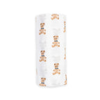 White blanket with teddy bear pattern on a white background